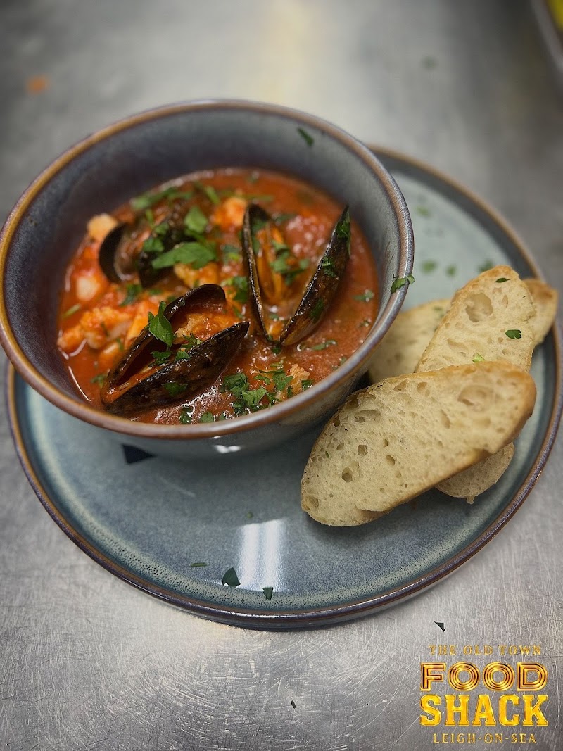 Food Shack seafood dish — mussels in a rich tomato broth with crostini