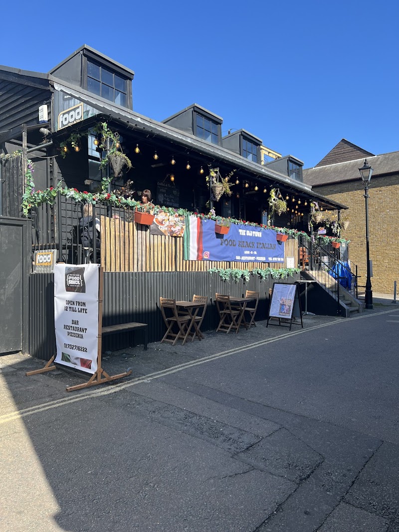 Food Shack restaurant exterior on Leigh-on-Sea High Street, with outdoor seating in the sun